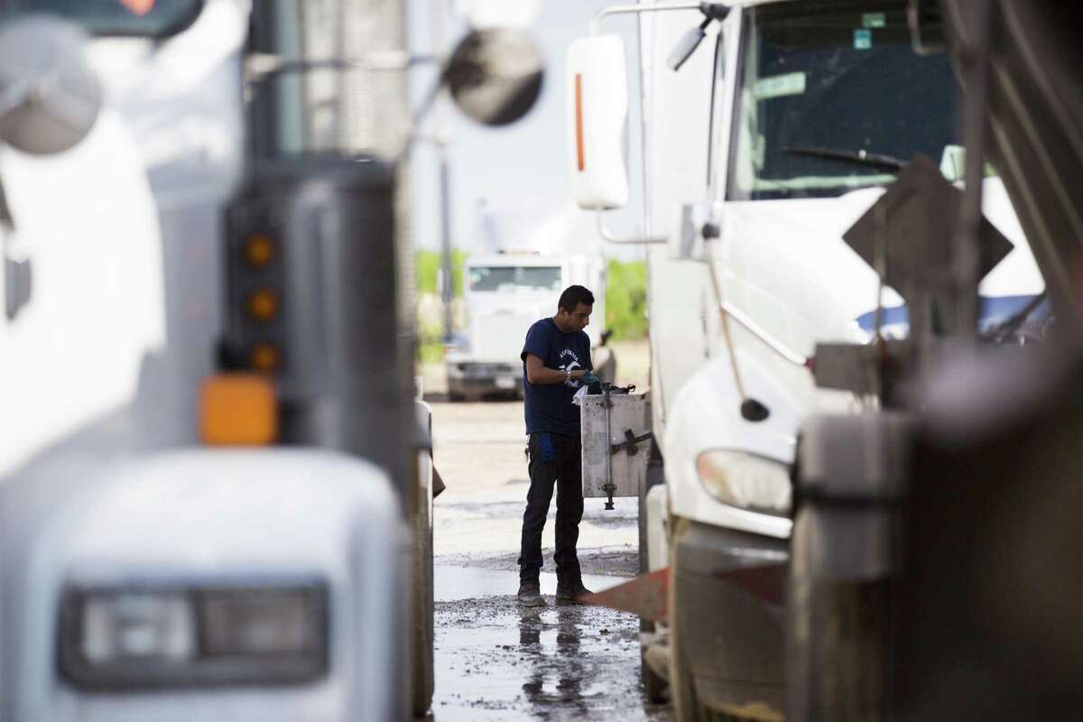 A trucker waits at the Port of Brownsville for a shipment to later return south of border on Friday, March 22, 2019, in Brownsville.