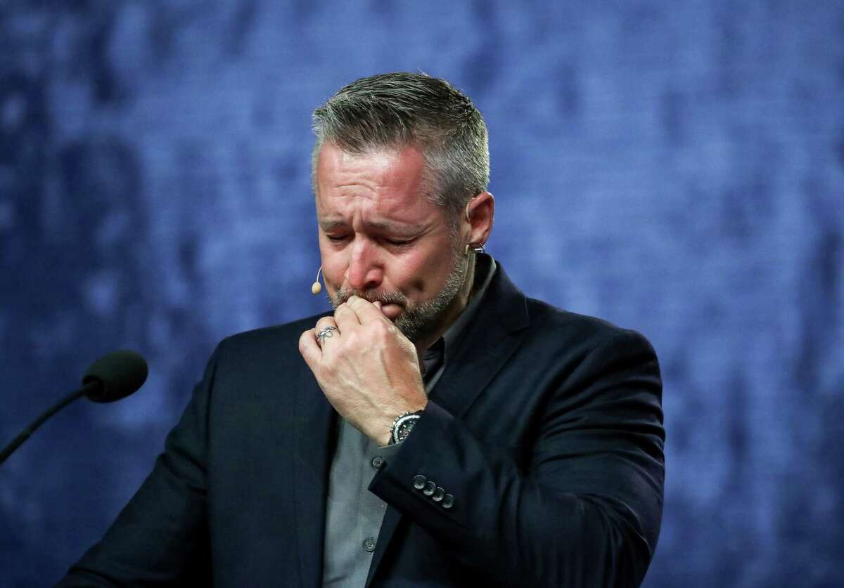 J. D. Greear, president of the Southern Baptist Convention, becomes emotional while talking about sexual abuse within the SBC on the second day of the SBC's annual meeting on Wednesday, June 12, 2019, in Birmingham.
