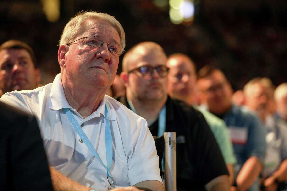 Lynn Greear, father of Southern Baptist Convention President J. D. Greear, cries while listening to his son talk about sexual abuse within the SBC on the second day of the SBC's annual meeting on Wednesday, June 12, 2019, in Birmingham. "Seeing my son up there, I'm very thankful God has used him to bring this to light," Greear said.