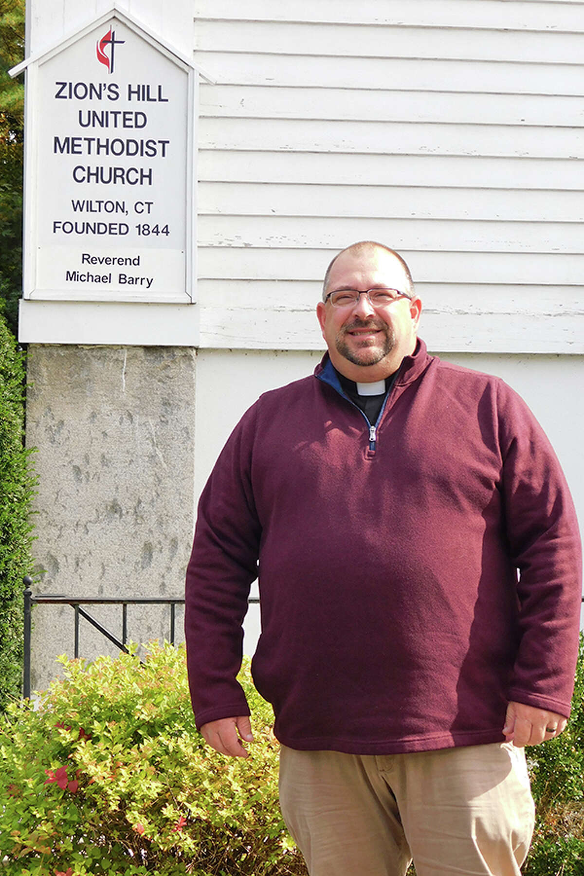 Zion's Hill United Methodist Church's new minister, the Rev. Michael Barry, outside the church at 470 Danbury Road. - Kendra Baker photo