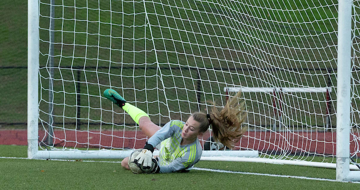 Freshman goalie Erynn Floyd secured Wilton's 2-1 upset win over St. Joseph with this save in the second round of penalty kicks. - GretchenMcMahonPhotography.com