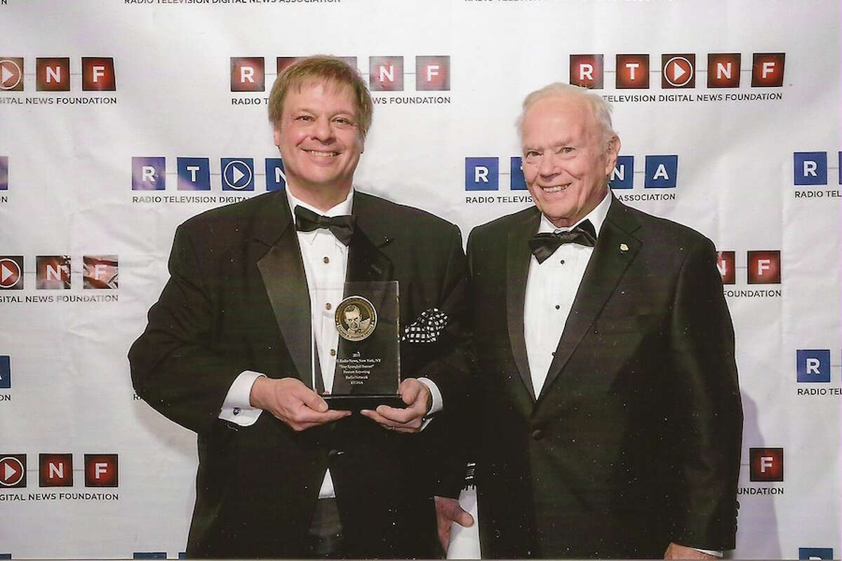 Dave Barrett is joined by his father, Nelson Barrett, when Dave won the Edward R. Murrow Award in 2015. — Contributed photo
