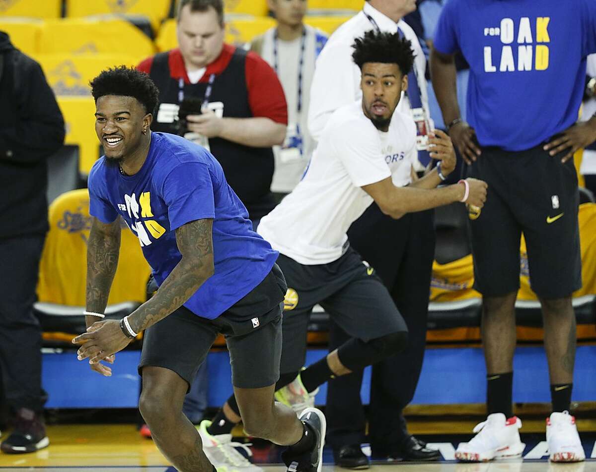 Golden State Warriors’ Jordan Bell and Quinn Cook go through their pregame warmups for game 6 of the NBA Finals between the Golden State Warriors and the Toronto Raptors at Oracle Arena on Thursday, June 13, 2019 in Oakland, Calif.