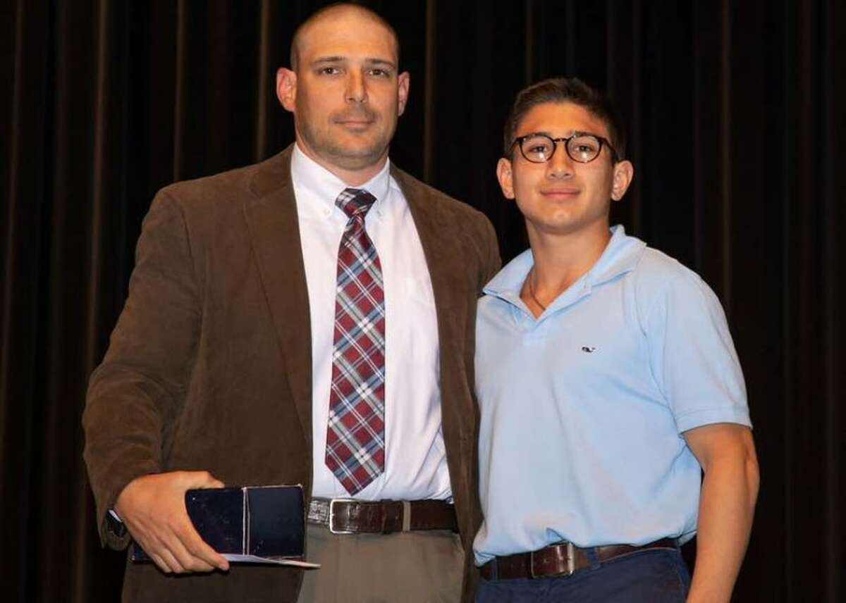 Outgoing Wilton High wrestling coach John Foldeak with Nick Rende as the recent Wilton High School Senior Sports Awards Night. — GretchenMcMahonPhotography.com