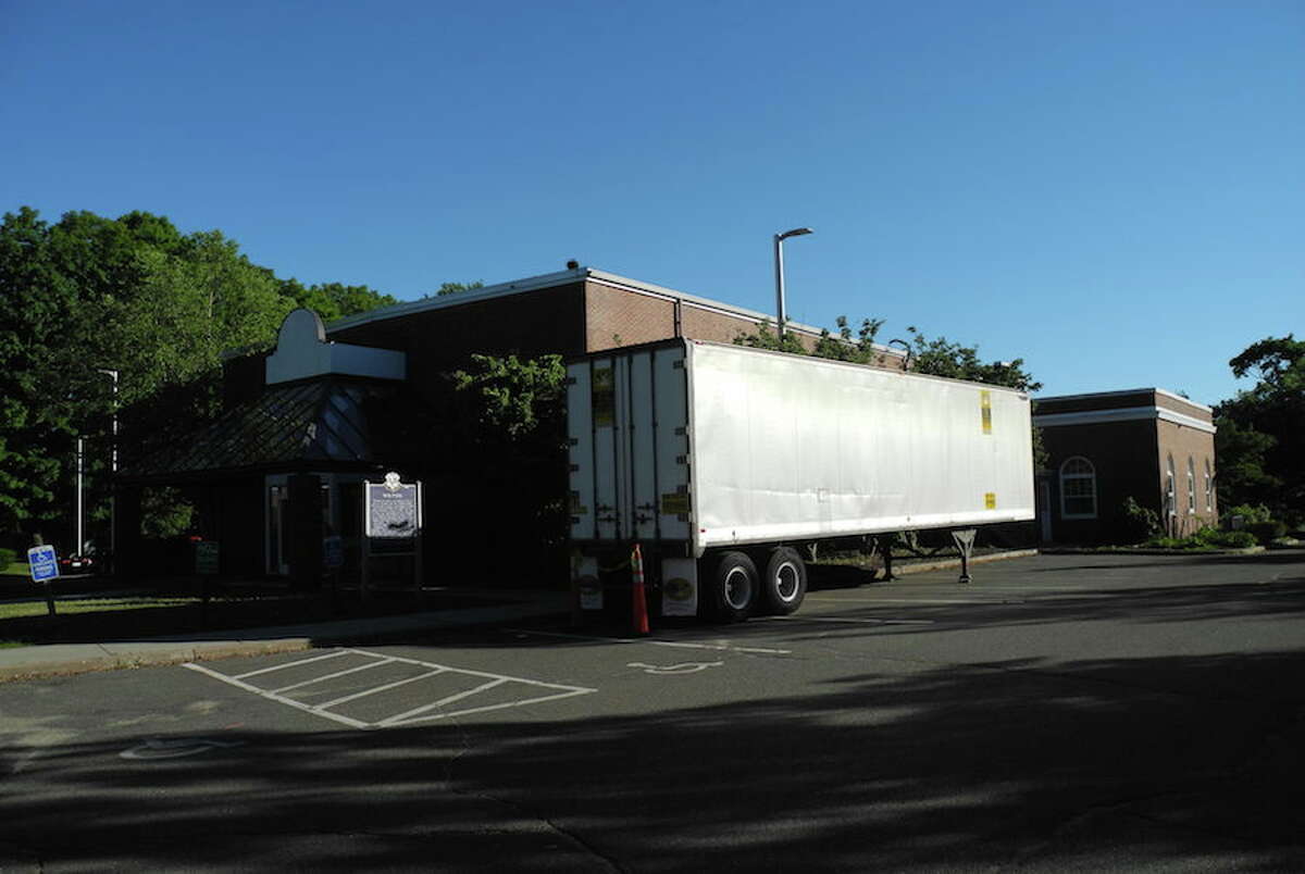 A truck outside town hall is being used to temporarily store furniture from offices that are being cleaned. — Jeannette Ross photo