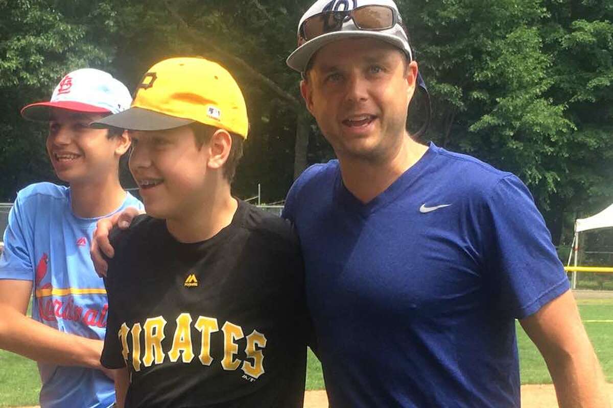 Max Jarvie won the annual Wilton Little League Home Run Derby on June 9. He is shown here with WLL coach Jeff Szymanowicz, who handled pitching duties at the event.