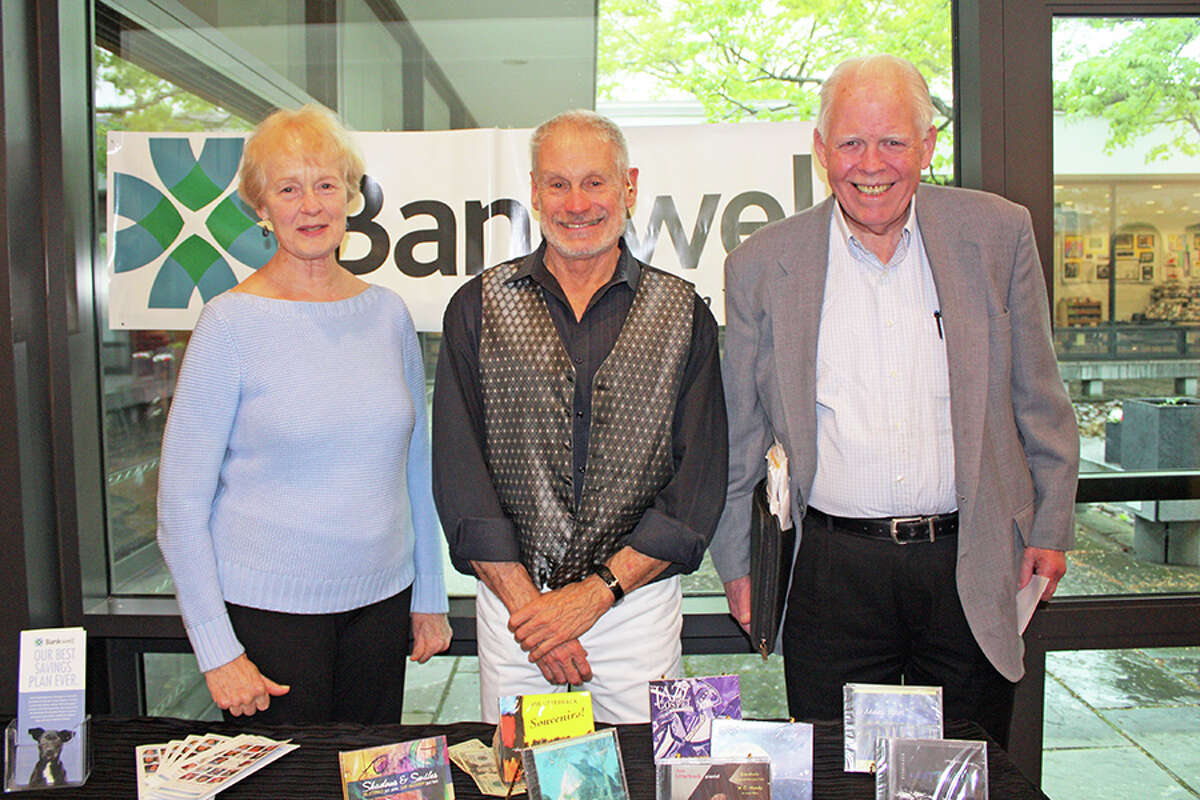 Stay at Home in Wilton vice president Ann Newton, left, Dr. Joe Utterback and Stay at Home in Wilton chairman Phil Richards at Wilton Library. - Contributed photo