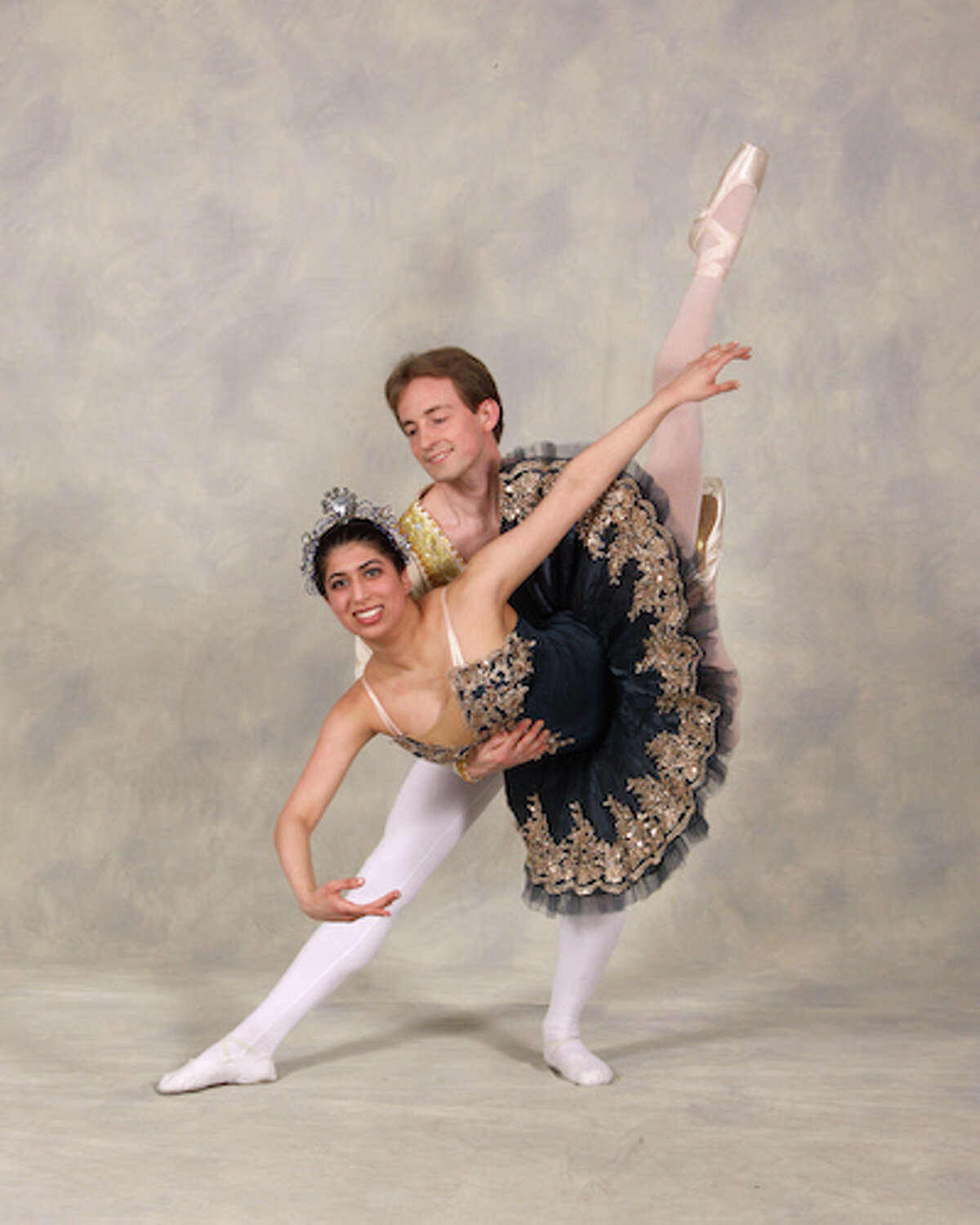 Wilton High School student Dilshad Dinshaw dances with Brian Froehlich.