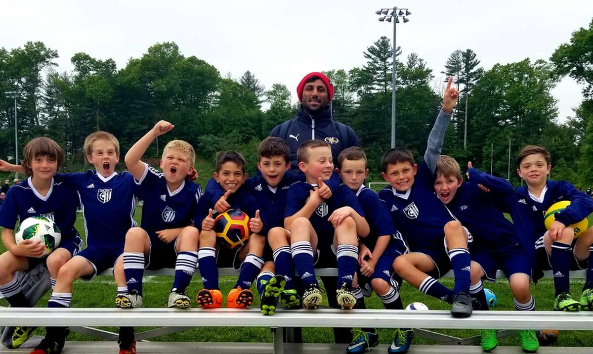 The Wilton Blue U-9 boys soccer team won two games at the Newtown Memorial Day Weekend Tournament. From the left: Jack Mulfinger, Joshua Comiskey, Liam Backman, Caio Thakur, Gavin Levenherz, Ryan Vermeulen, Sean Kaliski, Mario Coppola, Conor Filip, Jake Albanese and head coach Ritesh Mistry.