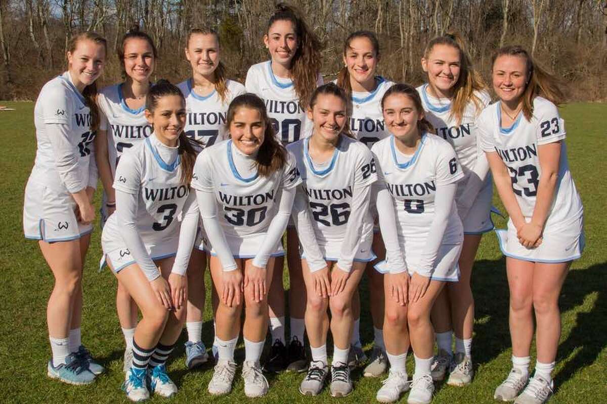 The Wilton High girls varsity lacrosse team will honor its senior before tonight's home game at Lilly Field. From the left, back row: Molly Ward, Carly Lattimer, Emmy Goodwin, Megan Lynch, Eva Greco, Olivia Roman and Paisley Eagan: front row: Paige Brown, Zoe Lash, Julia Bonnist and Chess Cawley. — GretchenMcMahonPhotography.com