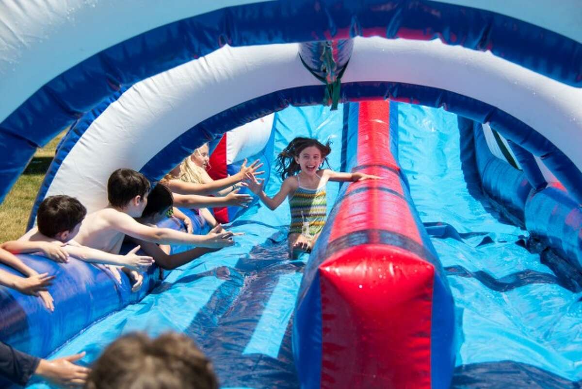 Ridgefield Academy's 15-foot water slide, The Patriot Plunge, is a highlight for campers.