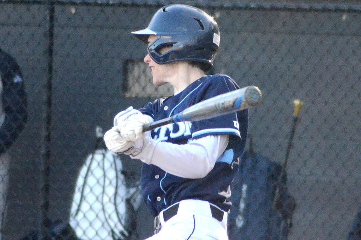 Chris Tienken connects for a hit during the Wilton High baseball team's game last week at home. — J.B. Cozens photo