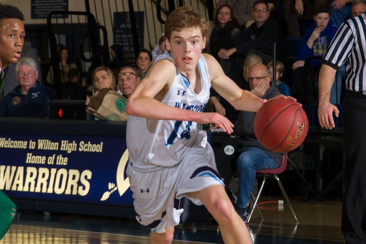 Scott Cunningham and the Wilton High boys basketball team will try to reach the state semifinals for the second straight season when they host Newtown on Monday night in the quarterfinals. — GretchenMcMahonPhotography.com