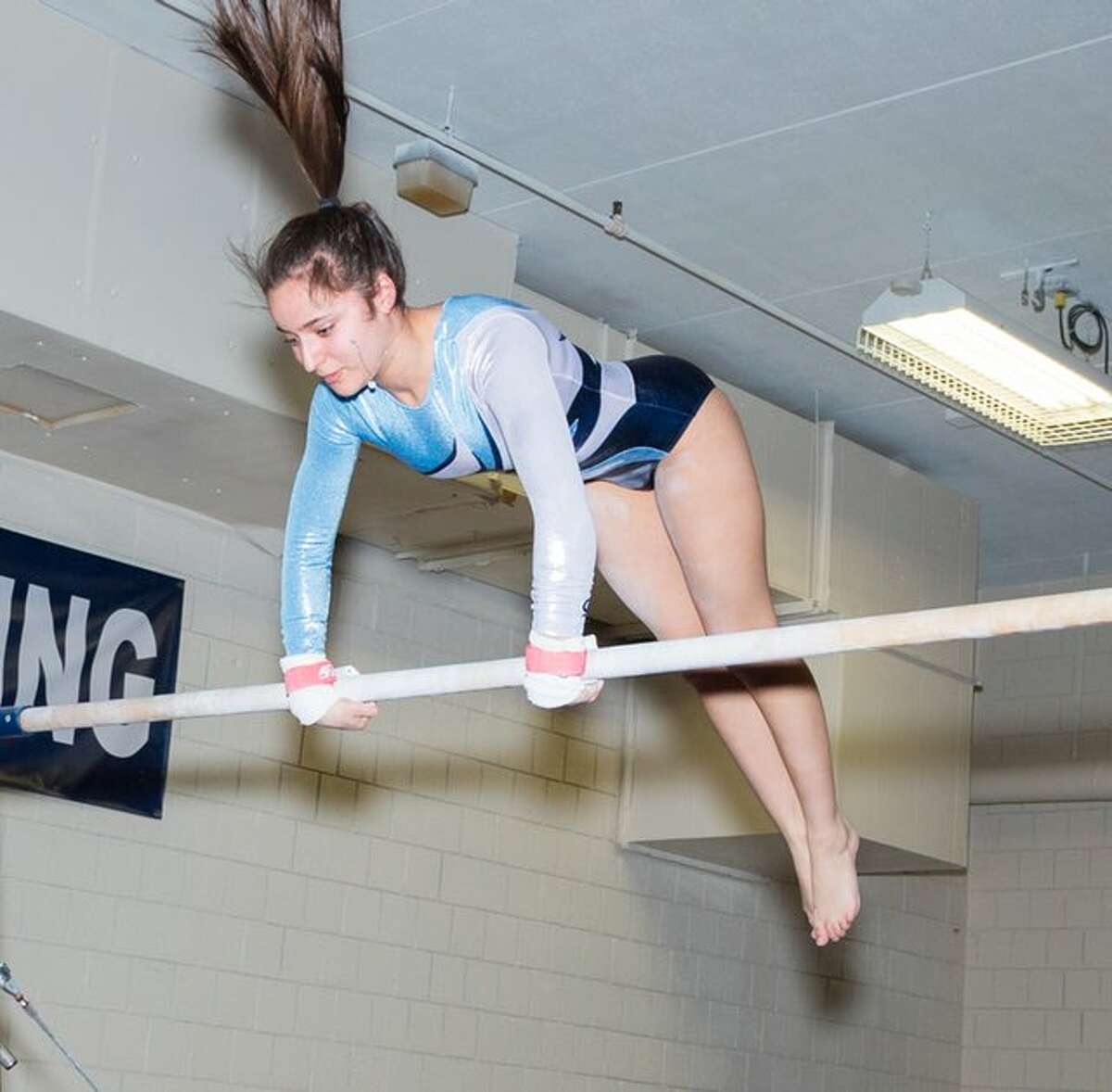 Wilton's Brooke Taffler earned second-team all-state honors with top 40 finishes on bars and vault at Saturday's State Open gymnastics championships. — GretchenMcMahonPhotography.com