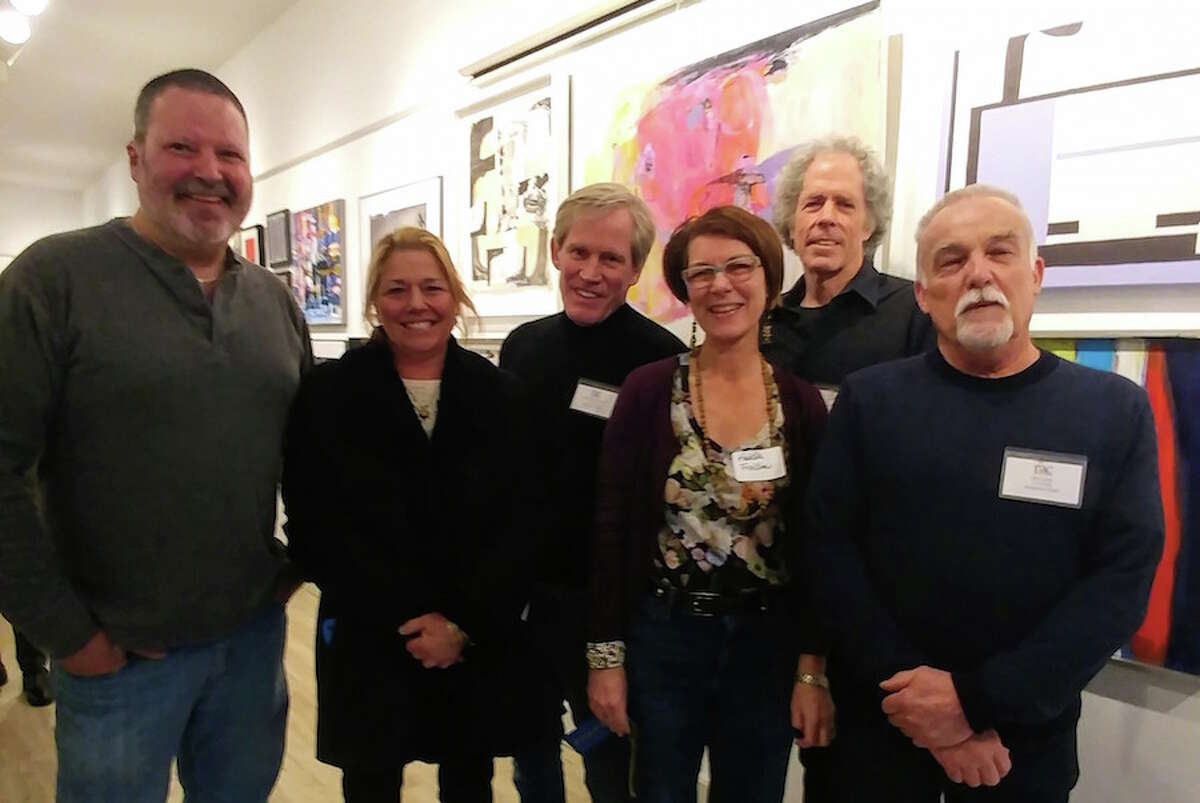 Dave Lindsay, left, the son of Hu Lindsay, joins the winners of the exhibition Abstractions: Wilton artist Amy Schott, co-chair Michael Brennecke and Heide Follin, plus judge Miggs Burroughs and co-chair Dan Long at the Rowayton Arts Center.