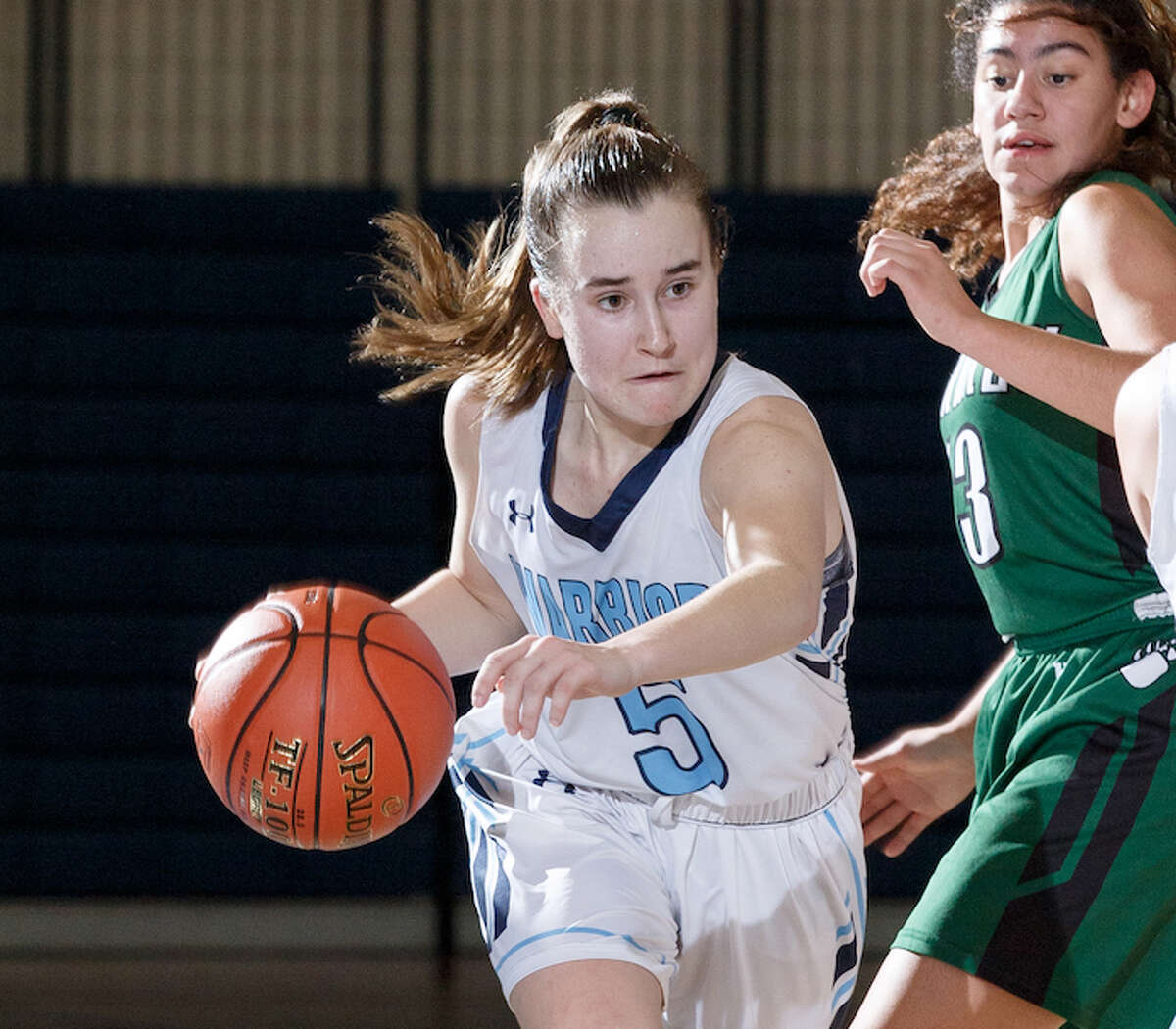 Zoe Rappaport and the Wilton High girls basketball team need three more wins to qualify for the state tournament. — GretchenMcMahonPhotography.com