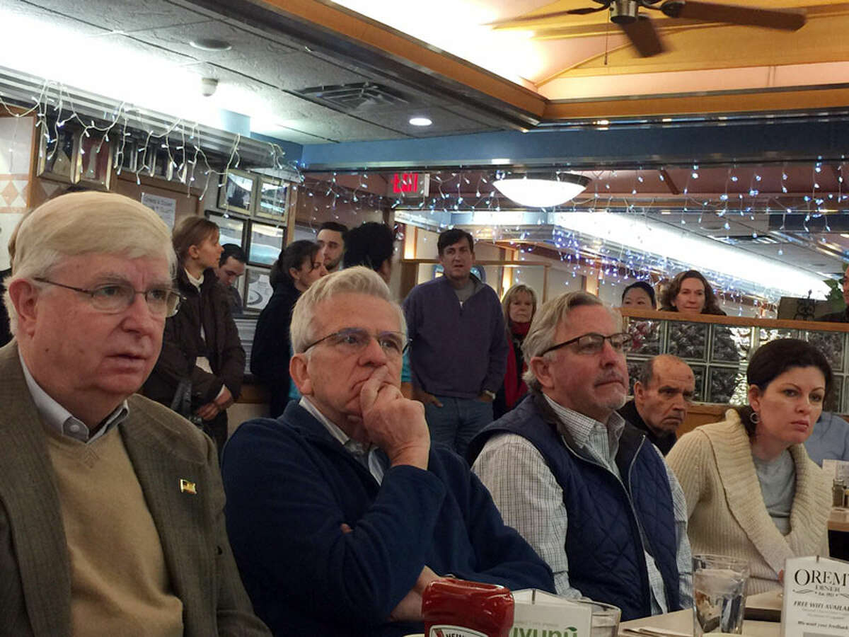 The audience listens to legislators Gail Lavielle and Tom O'Dea at their Coffee Hour at Orem's Diner. — Patricia Gay photo