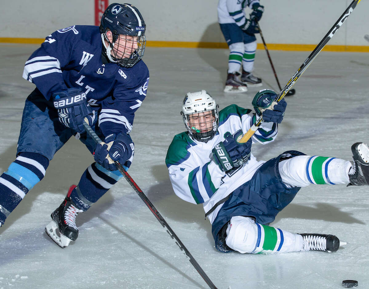 David Overbeeke skates around a fallen Norwalk/McMahon player during Wilton's 4-2 win last week. — GretchenMcMahonPhotography.com