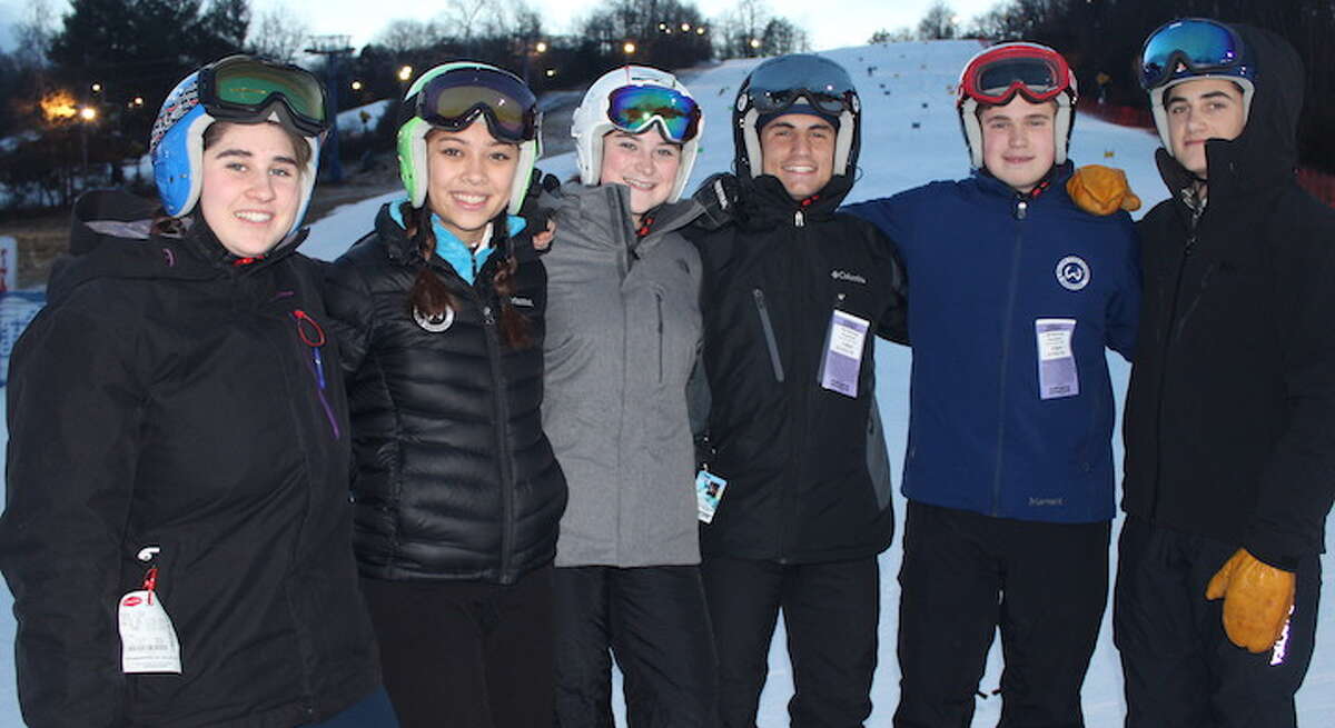 Hope Ulmann, Emily Welch, Emily O’Brien, Dom Polito, Scott Verrilli, and August Theoharides (left to right) are the captains for this year's Wilton High ski teams.