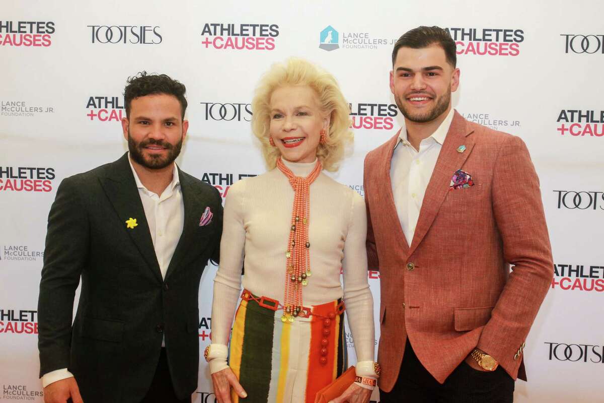 Jose Altuve, from left, Lynn Wyatt and Lance McCullers at Astros Team Up for Kids and K9s at Tootsies.