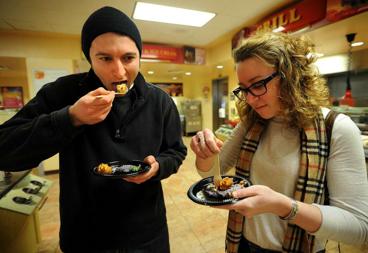 Siblings Andrew and Amanda Ciarlelli, of Watertown, eat at the Barone Campus Center Dining Hall at Fairfield University. Sen. Will Haskell, D-Westport, said there’s been a growing problem of college-aged people not having access to a “sufficient quantity of affordable, nutritious food.”