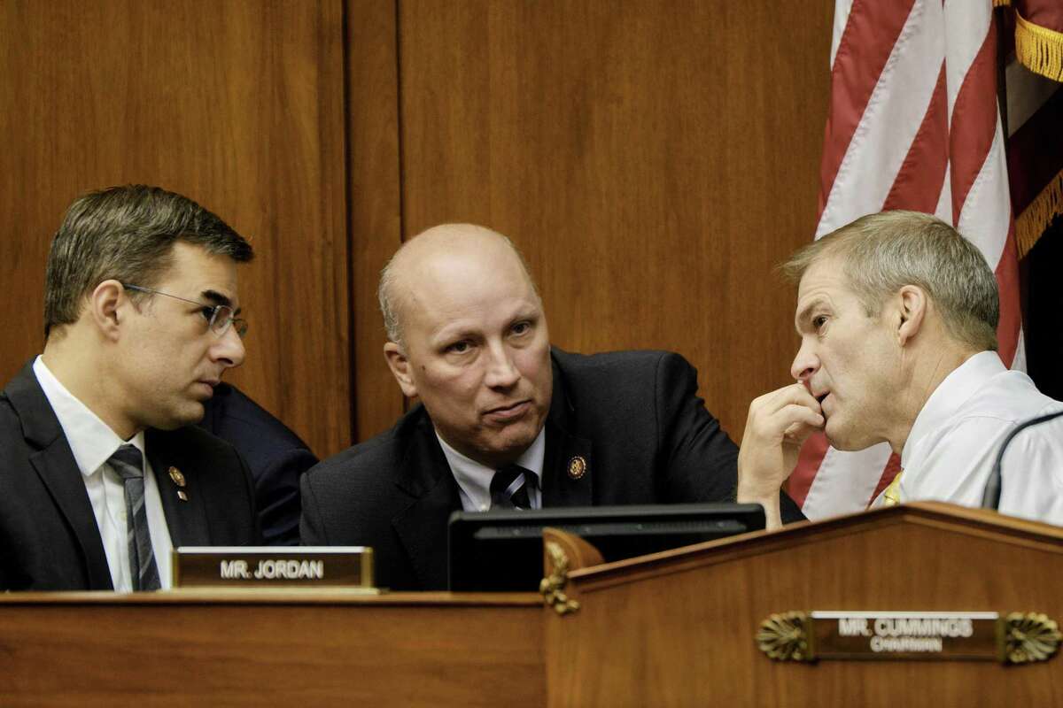 From left: Rep. Justin Amash (R-Mich.), Chip Roy (R-Texas), and Ranking Member Jim Jordan (R-Ohio) confer during a hearing of the House Oversight and Reform Committee considering a vote to recommend that the House hold Attorney General William Barr and Commerce Secretary Wilbur Ross in contempt, on Capitol Hill in Washington, June 12, 2019. President Donald Trump claimed executive privilege to block Congress’ access to documents about how a citizenship question was added to the 2020 census ahead of the committee's vote. (T.J. Kirkpatrick/The New York Times)