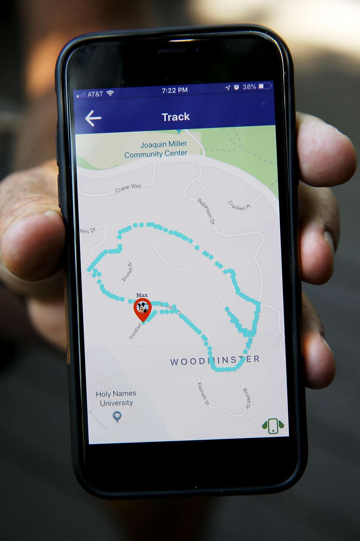 Gregory Gotts shows Max's, his border collie, route on the InvisiLeach app in Oakland, Calif., on Tuesday, June 11, 2019. Gotts has invented InvisiLeash, a small electronic device to attach to a dog or cat collar that allows the owner to track the animal's whereabouts.