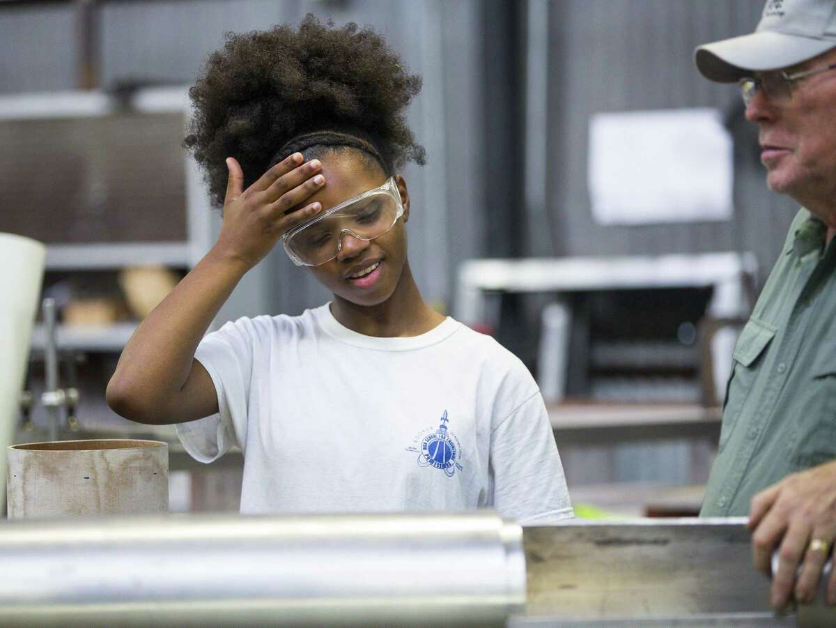 Booker T. Washington High School rising senior Rebekah Hodge reacts as she realizes they will need to order a last-minute new part for her team's rocket at TXRX Labs east of downtown Houston, Wednesday, June 5, 2019. Hodge's team will take the rocket to White Sands Missile Range this summer to launch the rocket with other schools. Hodge is the program manager for the rocket, in addition to serving as band president and carrying a 4.09 GPA into her senior year. Hodge said her school's wraparound resource specialist has helped her get a free bus pass (she lives on the city's south side and travels 3 hours round trip each day to school), provided her with toiletries and helped her secure a winter coat.