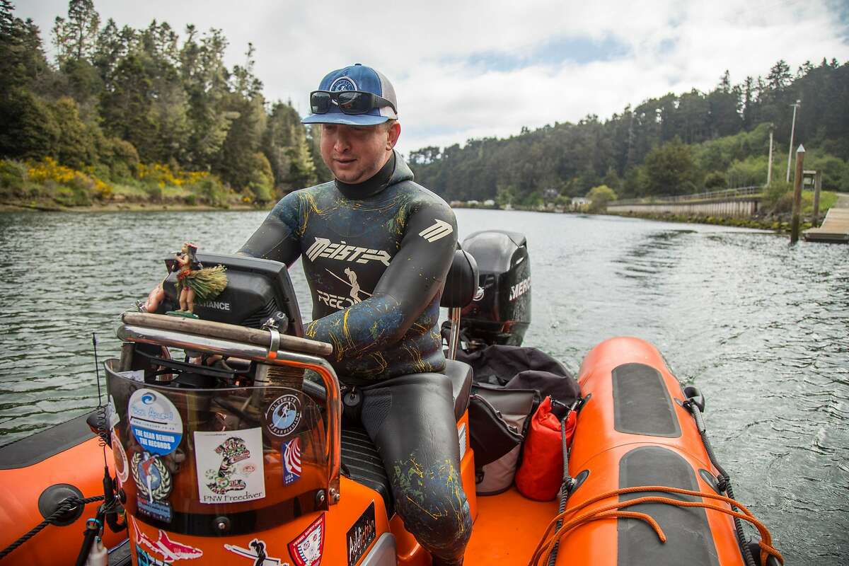 Greg Fonts drives his small boat out of the Noyo Harbor to go spearfishing and freedivingoff the north coast of California near Fort Bragg on Sunday, May 12, 2019.