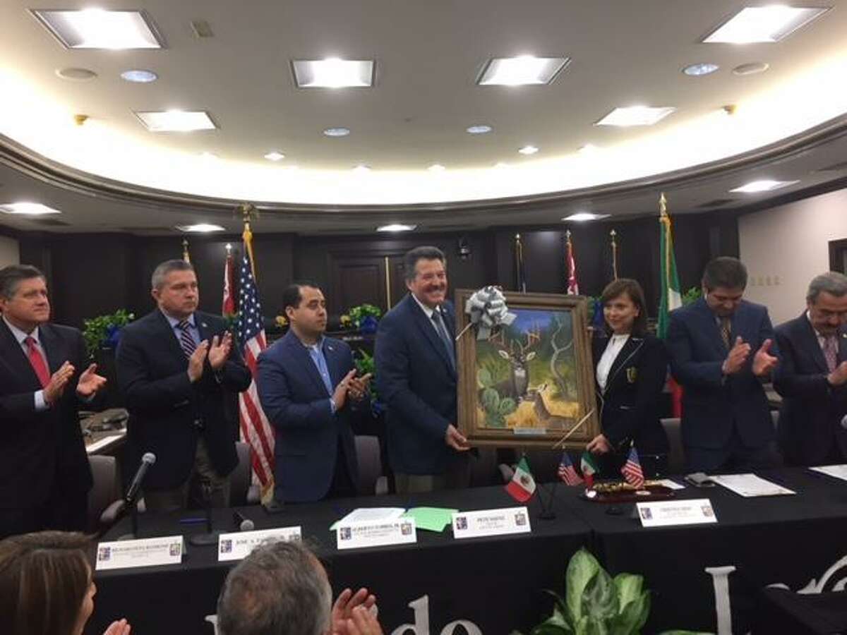City officials from both Laredo and Nuevo León gather at City Hall Council Chambers on Friday and exchange gifts.