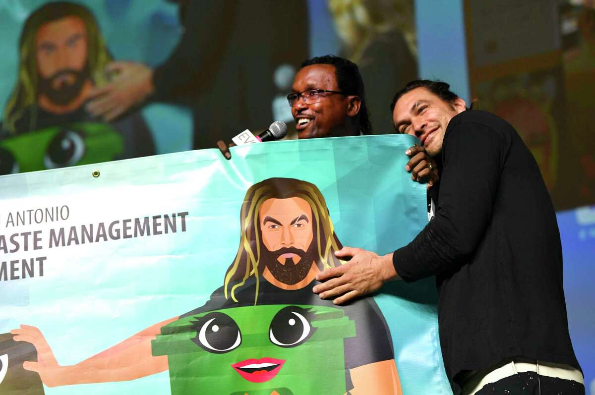Actor Jason Momoa, who plays Aquaman in DC superhero films, is recognized for his support of recycling by David McCary, director of the City of San Antonio’s Solid Waste Management Department, during Celebrity Fan Fest on Saturday, June 15, 2019. Marvel and DC Comics movie stars are scheduled to appear throughout the three-day event at Freeman Coliseum and Expos Halls.