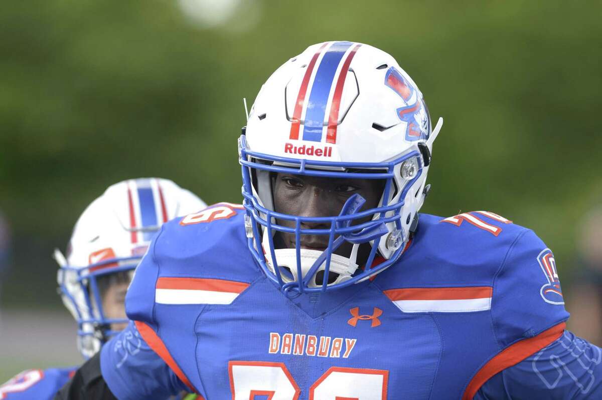 Danbury High School's Jah Joyner plays in the schools Blue & White spring football game on Friday night. June 14, 2019, at Danbury High School, Danbury, Conn. Defensive end Joyner recently committed to play at Boston College.
