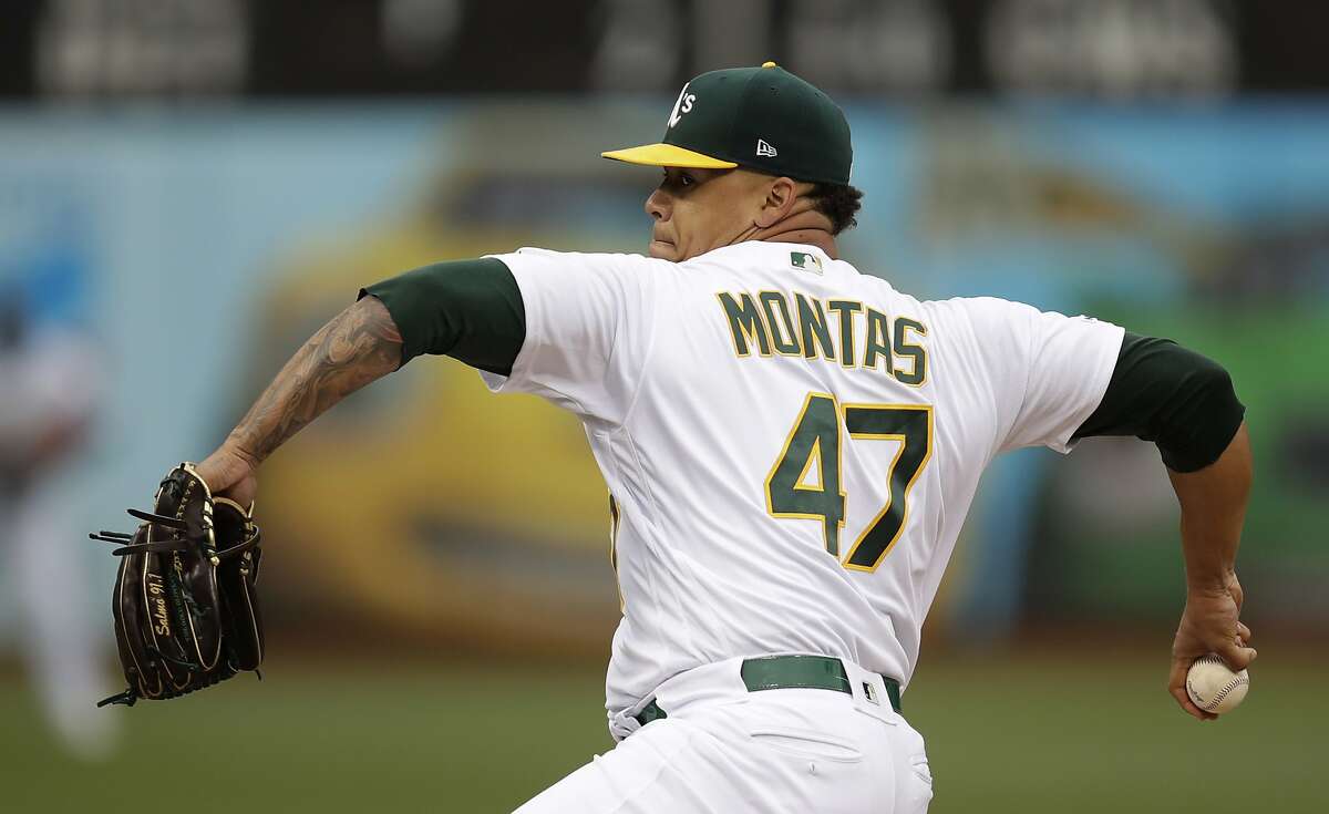 Oakland Athletics pitcher Frankie Montas works against the Seattle Mariners in the first inning of a baseball game Saturday, June 15, 2019, in Oakland, Calif. (AP Photo/Ben Margot)