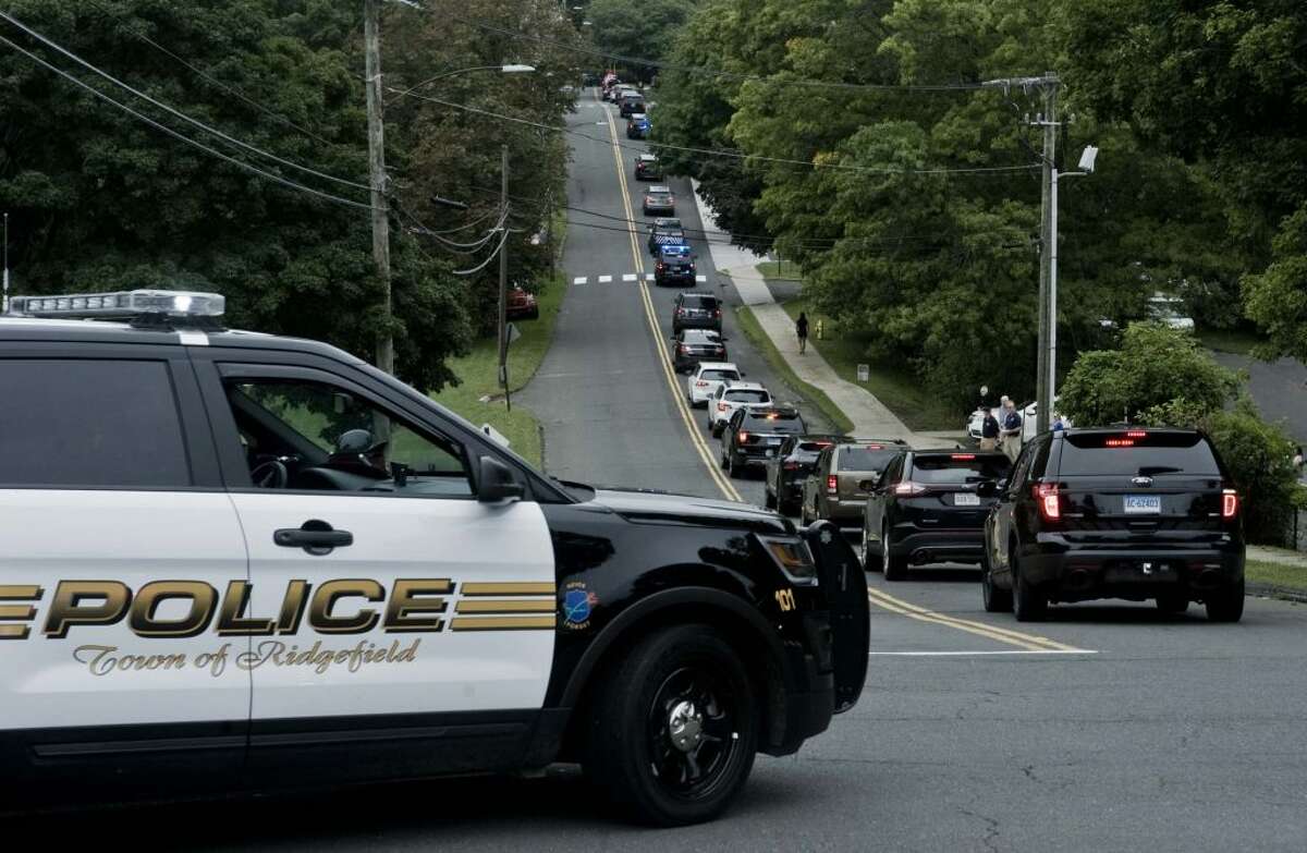 Police Chief John Roche's funeral procession drew hundreds of cops from around the state earlier this month. - Scott Mullin photo