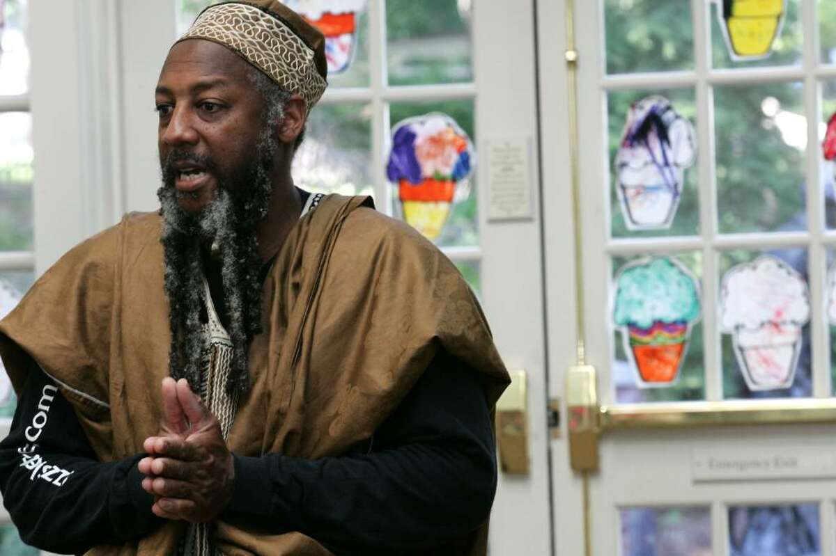 Eshu Bumpus entertained children and their parents at Perrot Memorial Library with African, African American and world folktales Thursday afternoon.