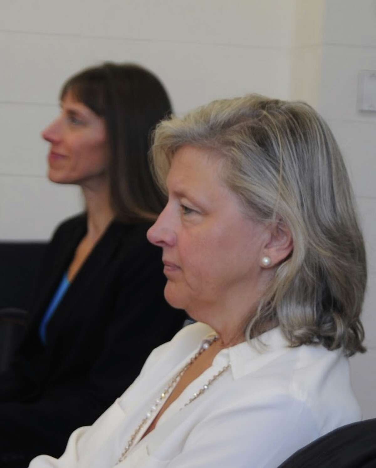 Cathy Savoca was appointed Saturday, Dec. 1, to fill a vacancy on the Planning and Zoning Commission. Behind her is Susan Consentino, who also interviewed for the seat. -Macklin Reid photo