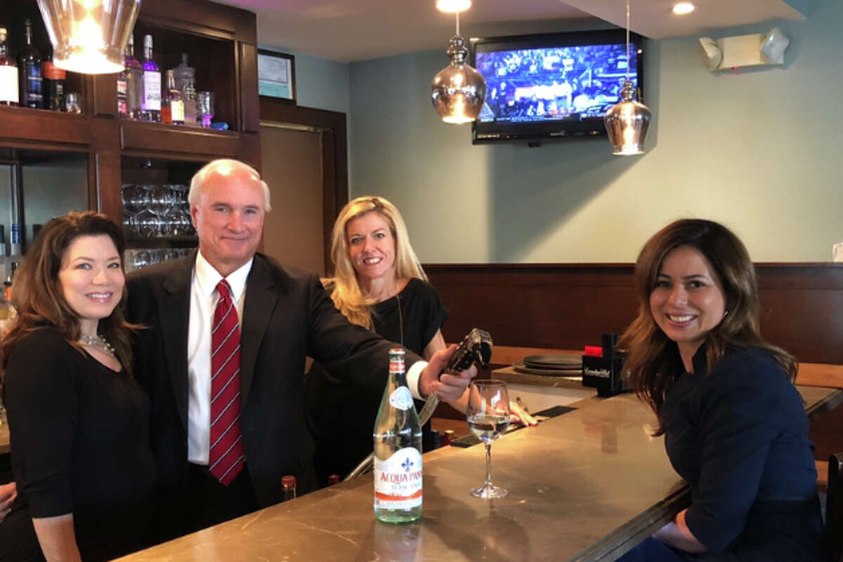 A guest bartending event at Gallo Ristorante will benefit Rides for Ridgefield. The bartenders include, from left to right: Kim Bova, executive director of the Ridgefield Chamber of Commerce; Rudy Marconi, Ridgefield's first selectman; Christine Mullen, president of the Chamber's Advisory Council; and Rosemarie Ferrante (seated), member of the Advisory Council.