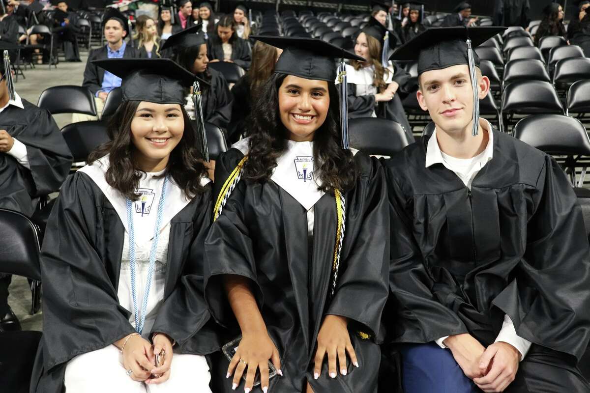The first graduates of Harlan High School crossed the stage Friday night.