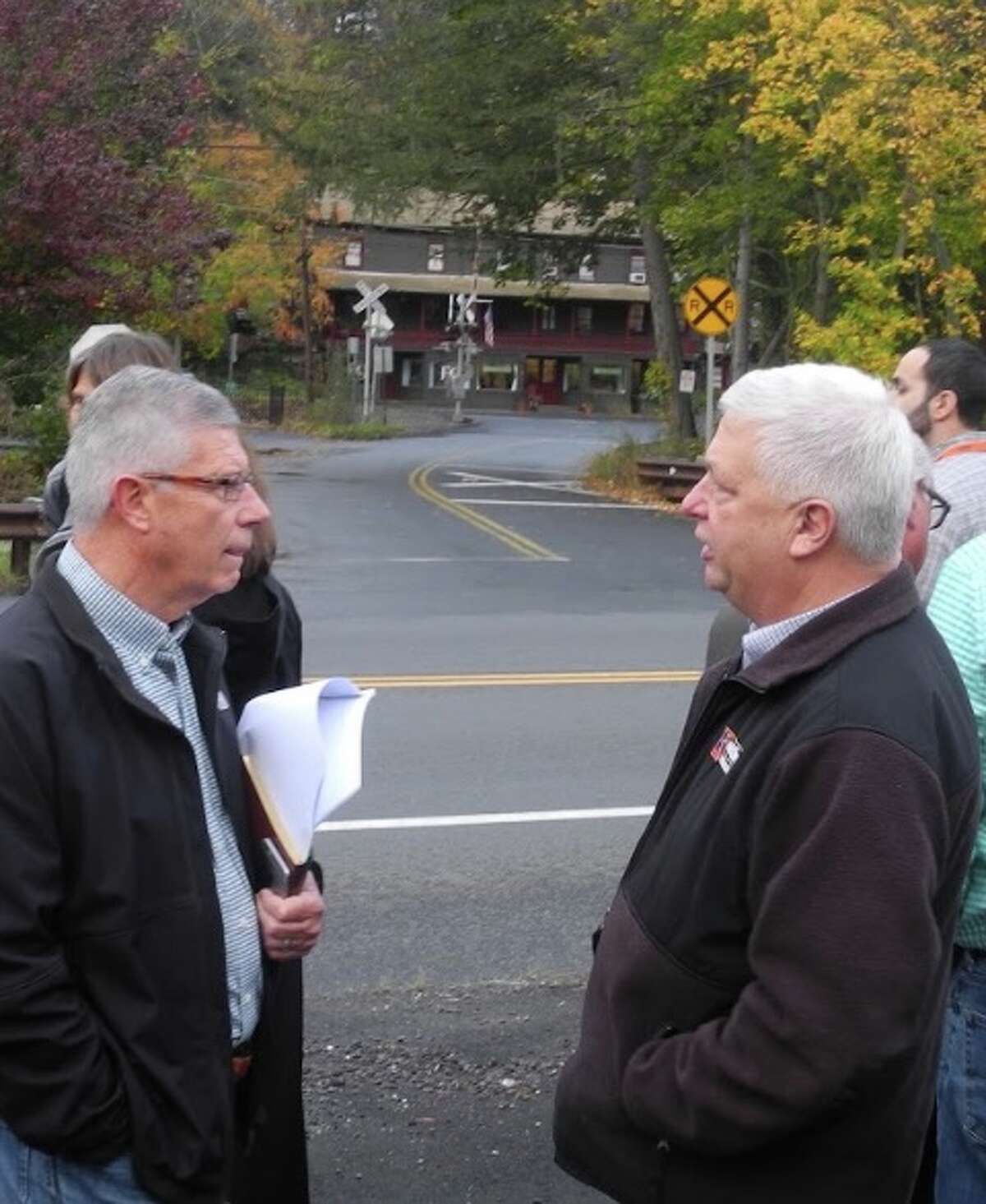 Recently retired town engineer Charlie Fisher, right, spoke with Selectman Bob Hebert in the fall of 2017, when town officials met area property owners to discuss the Branchville revitalization plan Fisher had put together. — Macklin Reid photo