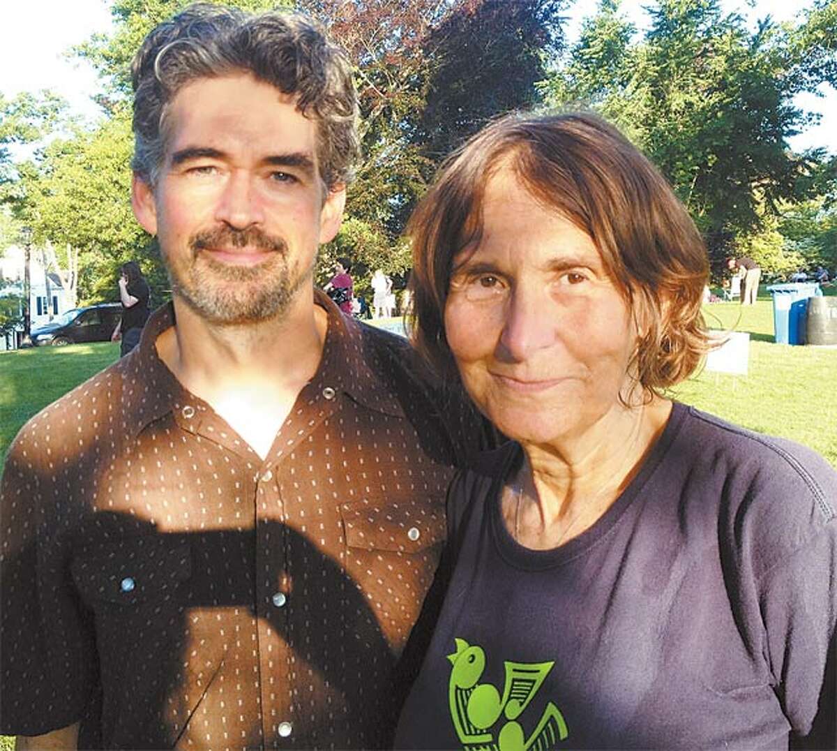 Barbara Manners with singer-songwriter Slaid Cleves before one of the free summer concerts she puts on in Ballard Park.