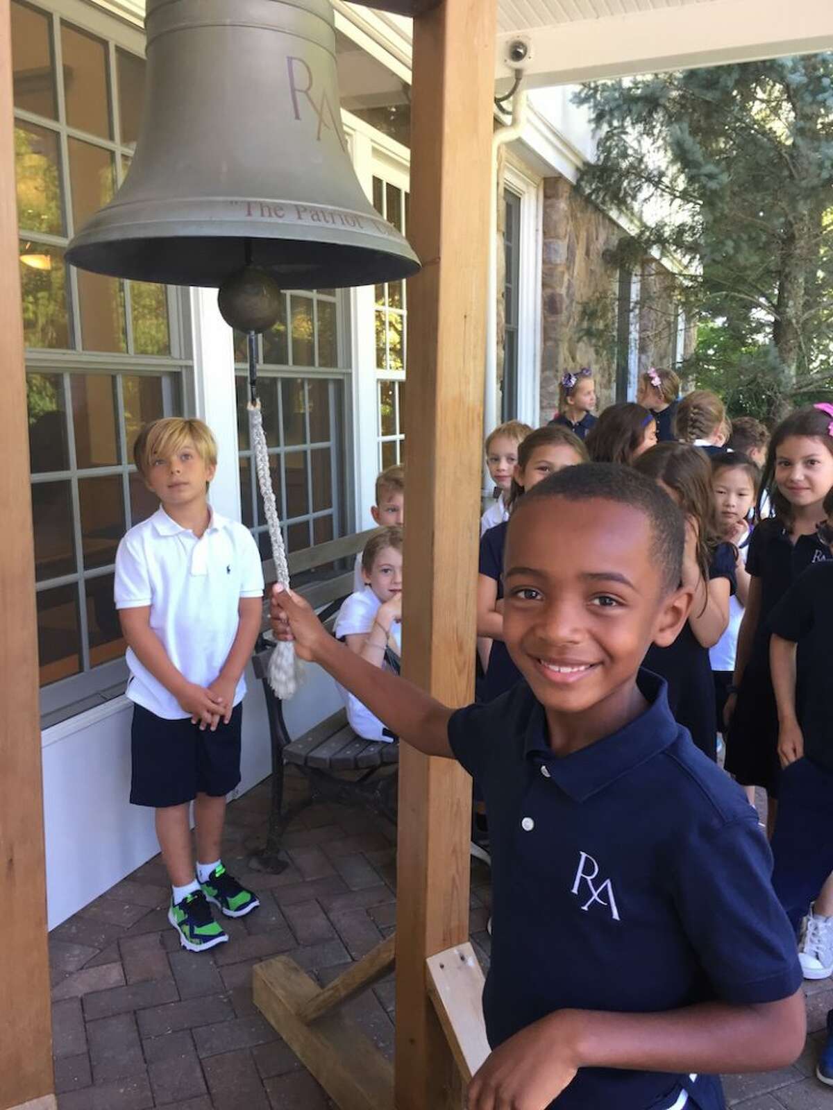 Ridgefield resident Oliver Howell rings in the school year with other Ridgefield Academy students.