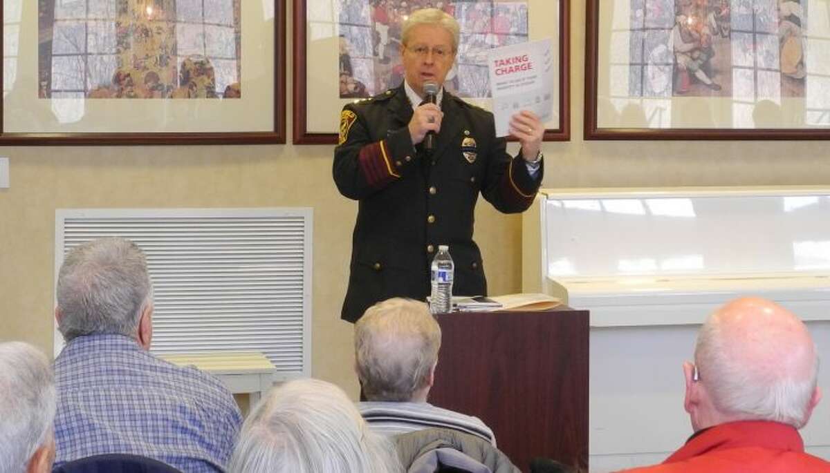 Ridgefield Police Chief John Roche discusses scams at Founders Hall in February 2017. He retired officially last Friday due to health reasons. — Macklin Reid photo