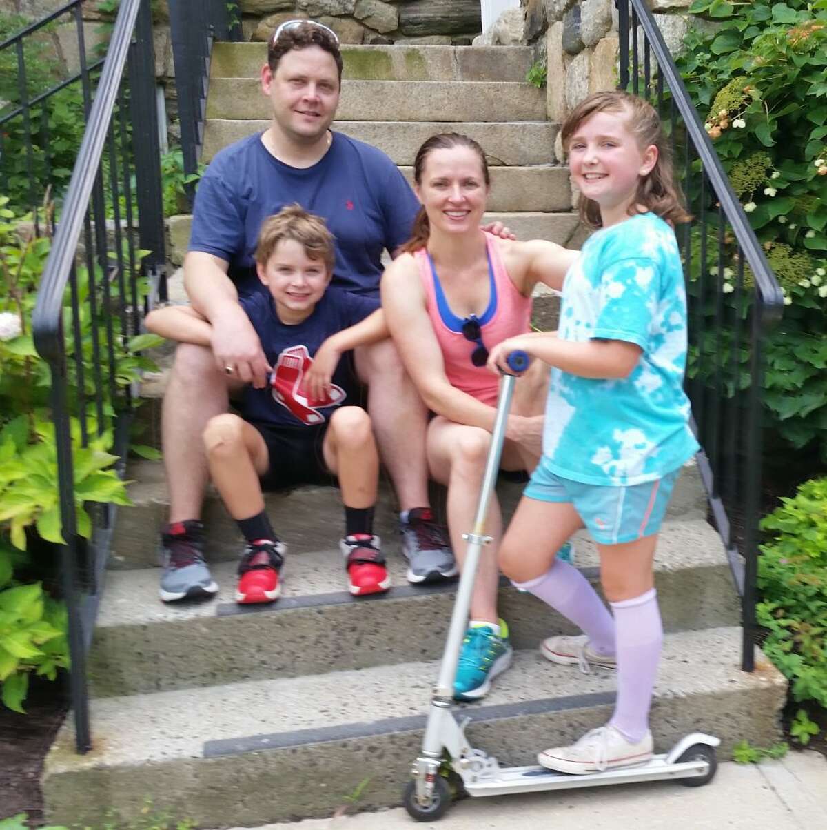 Leaders of Nutmeg Festival 2018, Nick and Claire Simard, with their son, Gabriel, and daughter, Amelie, who tested some of the toys for sale, including a Razor scooter.