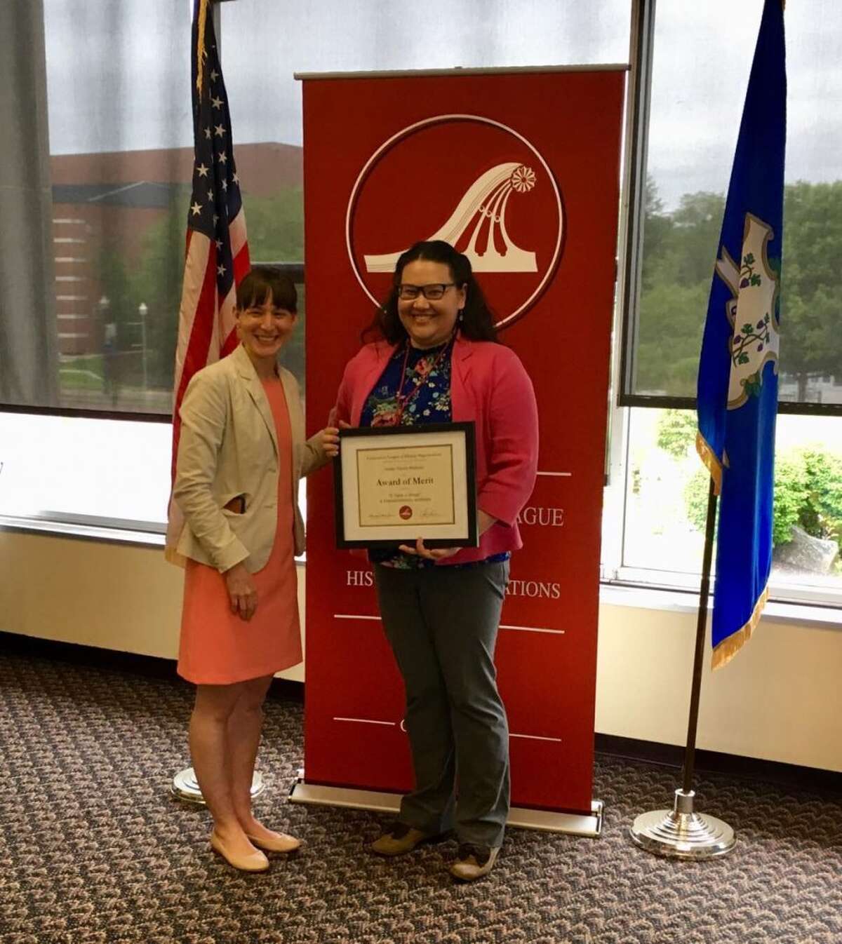 The CHLHO award was presented by CLHO Executive Director, Laurie Lamarre (left) and was accepted by KTM&HC's assistant museum director, Catherine Prescott (right), lead curator for the exhibition.