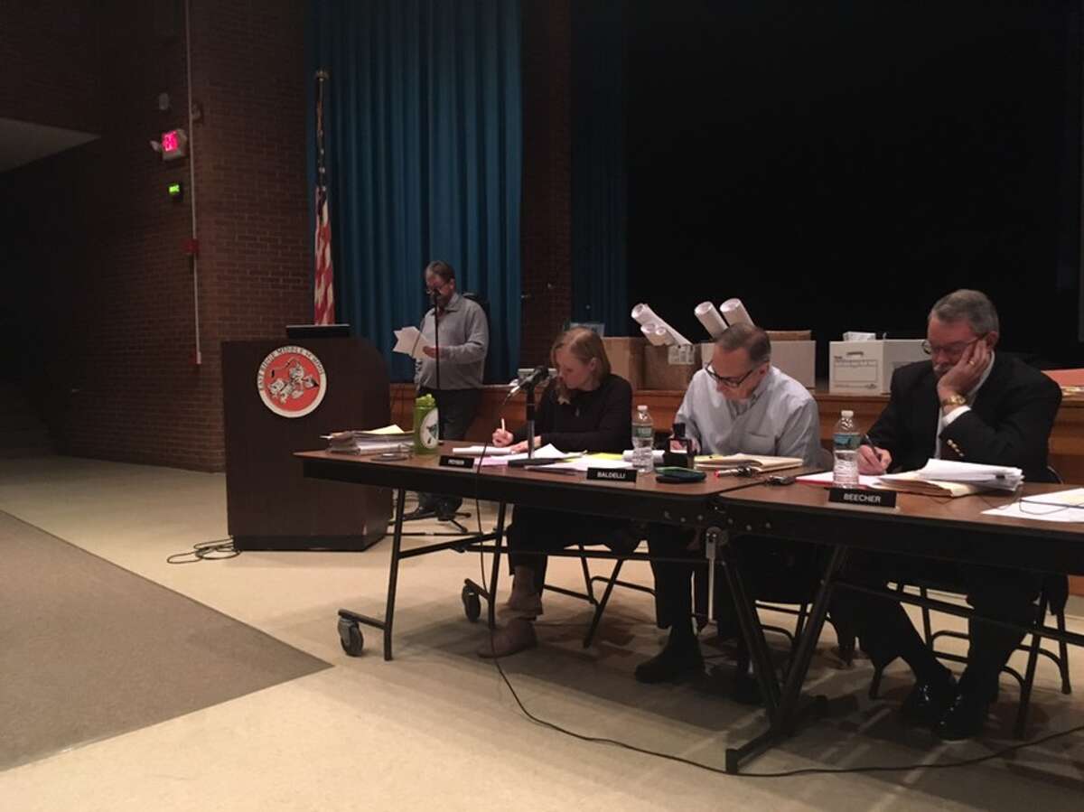 Attorney Robert Jewell prepares comments for the Planning and Zoning Commission Wednesday, Dec. 12. — Peter Yankowski photo