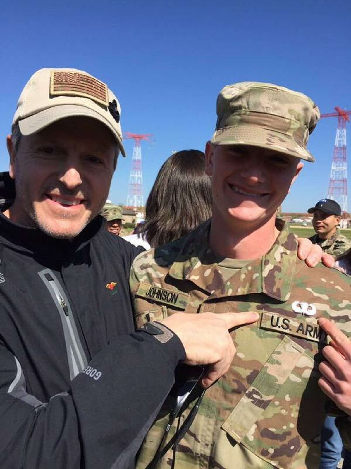 Retired Army Col. Samuel Johnson points to the Parachutist Badge he pinned on his son Pvt. Bradley upon graduation from Airborne School at Fort Benning, Ga. That same badge was earned and worn by Bradley?s late grandfather, retired Col. Charlie Johnson and dad, Samuel. (Provided)