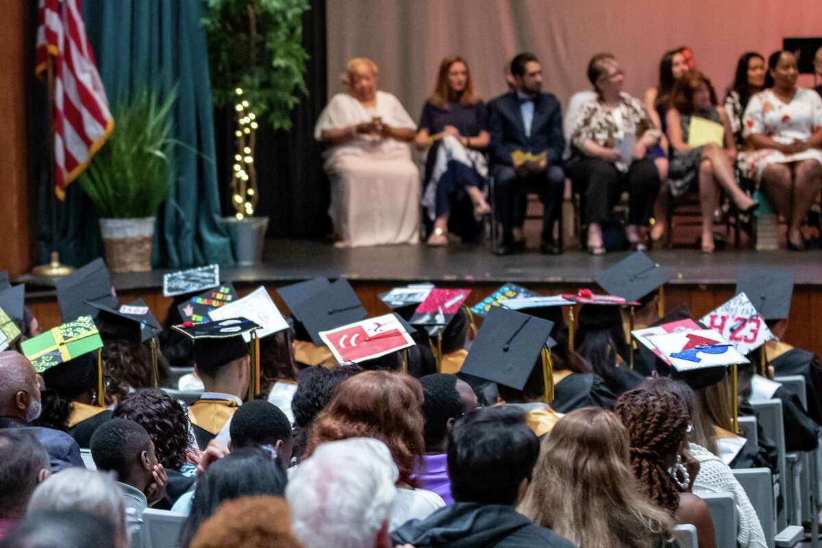 Decorated graduation caps are on display in the front of the auditorium at the graduation for the class of 2019 for the Academy of Information Technology & Engineering on June 17, 2019 at the Rippowam Auditorium in Stamford, CT.