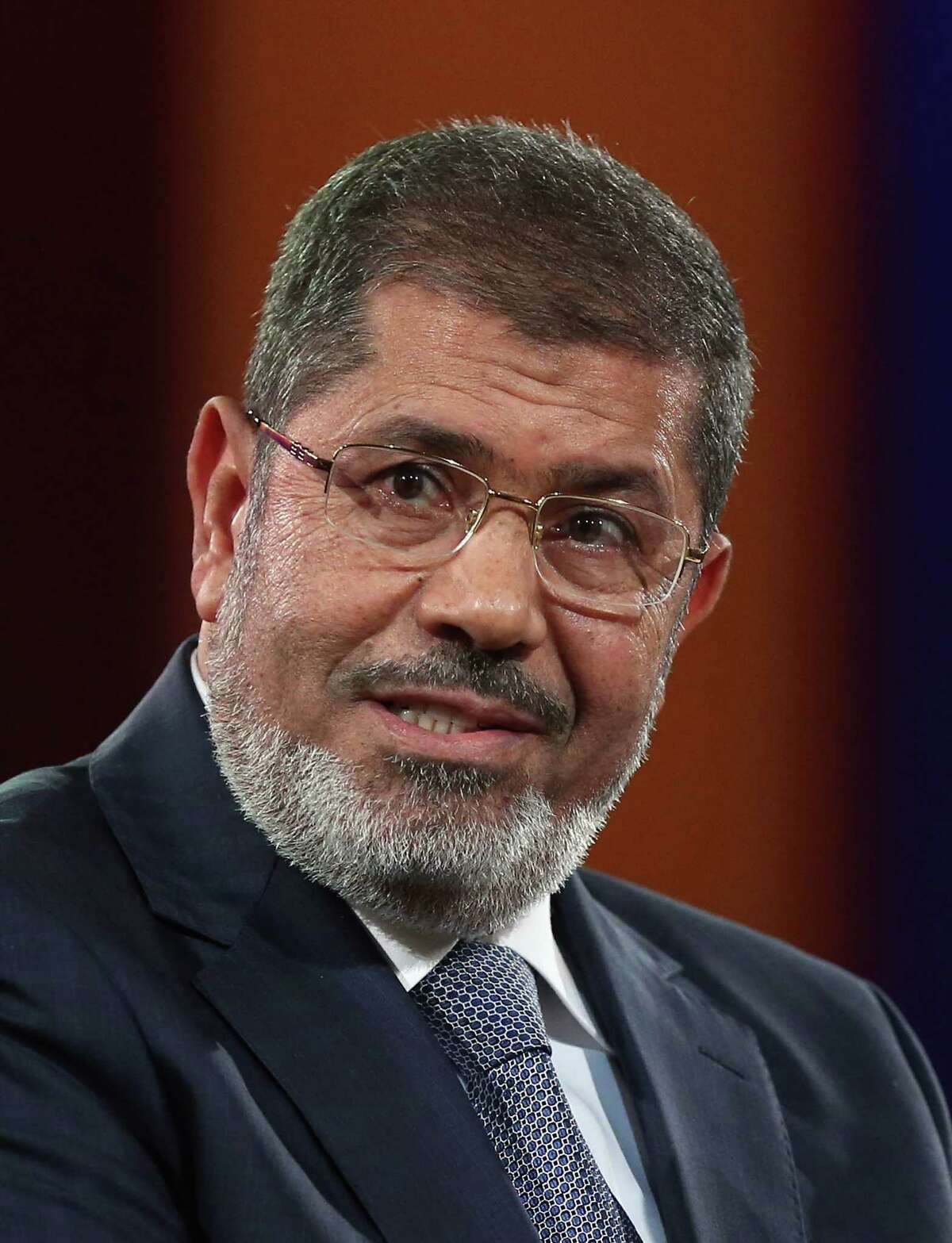 FILE - JUNE 17, 2019: According to state TV, ousted Egyptian President Mohammed Morsi has died at the age of 67 after fainting in a courtroom. NEW YORK, NY - SEPTEMBER 25: Egyptian President Mohamed Morsi speaks at the Clinton Global Initiative meeting on September 25, 2012 in New York City. Timed to coincide with the United Nations General Assembly, CGI brings together heads of state, CEOs, philanthropists and others to help find solutions to the world's major problems. (Photo by Mario Tama/Getty Images)