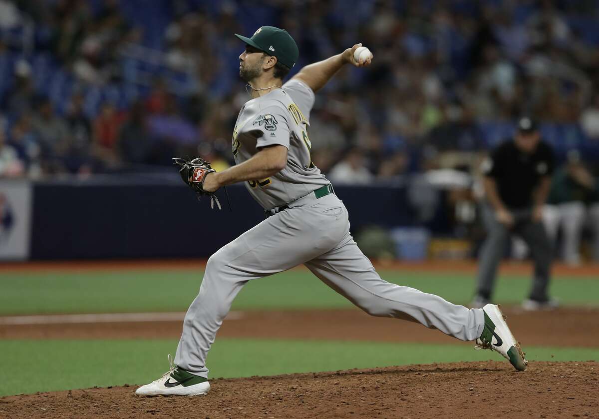 Oakland Athletics relief pitcher Lou Trivino during the eighth inning of a baseball game against the Tampa Bay Rays Tuesday, June 11, 2019, in St. Petersburg, Fla. (AP Photo/Chris O'Meara)