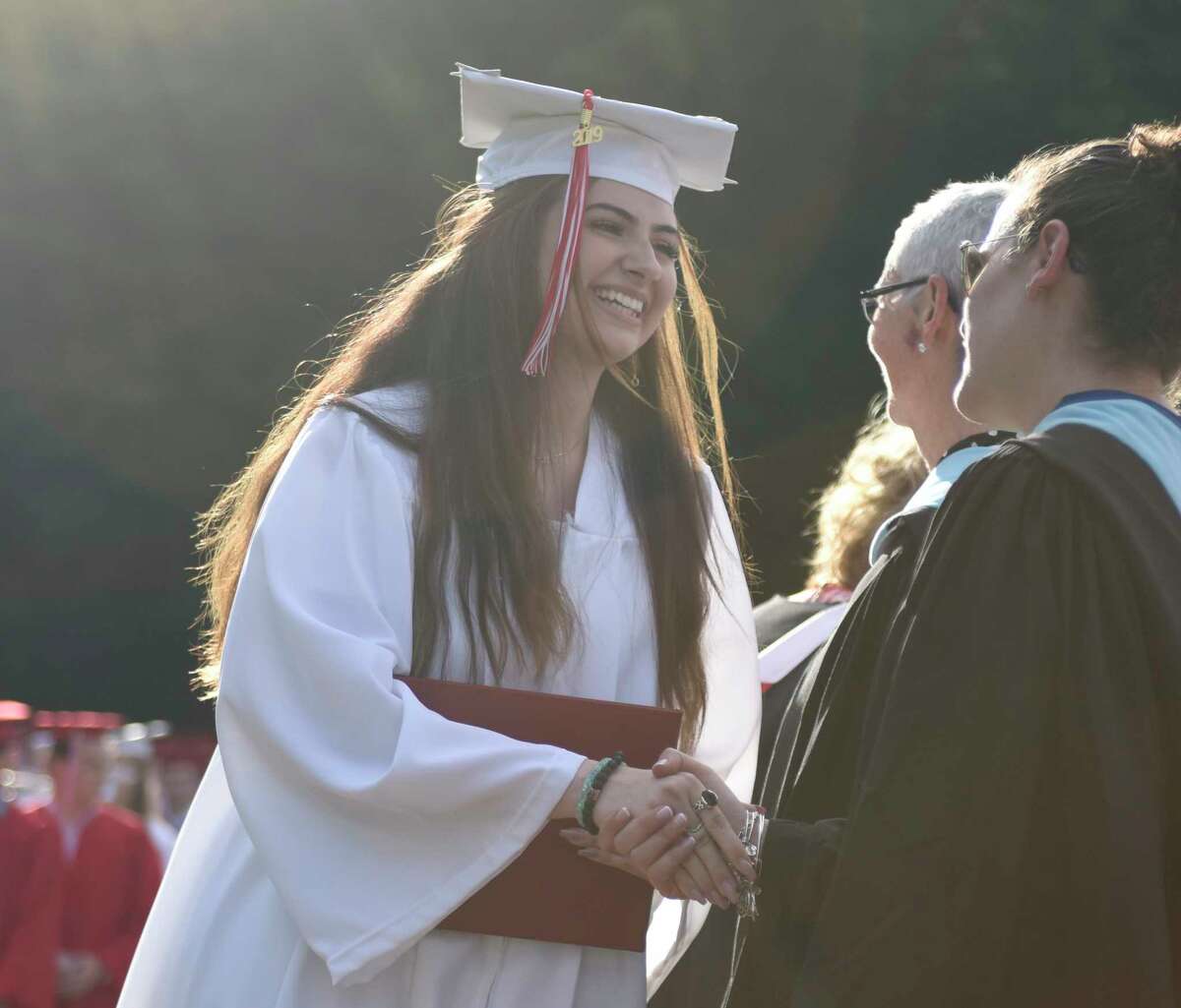 Photos from the 2019 Graduation at Greenwich's High School's Cardinal Stadium in Greenwich, Conn. Monday, June 17, 2019. Emmy-winning musician and composer Rob Mathes, GHS Class of 1981, delivered the commencement speech as 677 students received their diplomas.